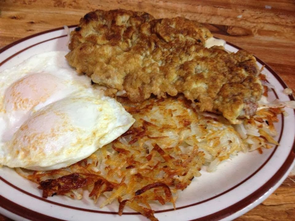 Hearty breakfast dishes on a simple table.